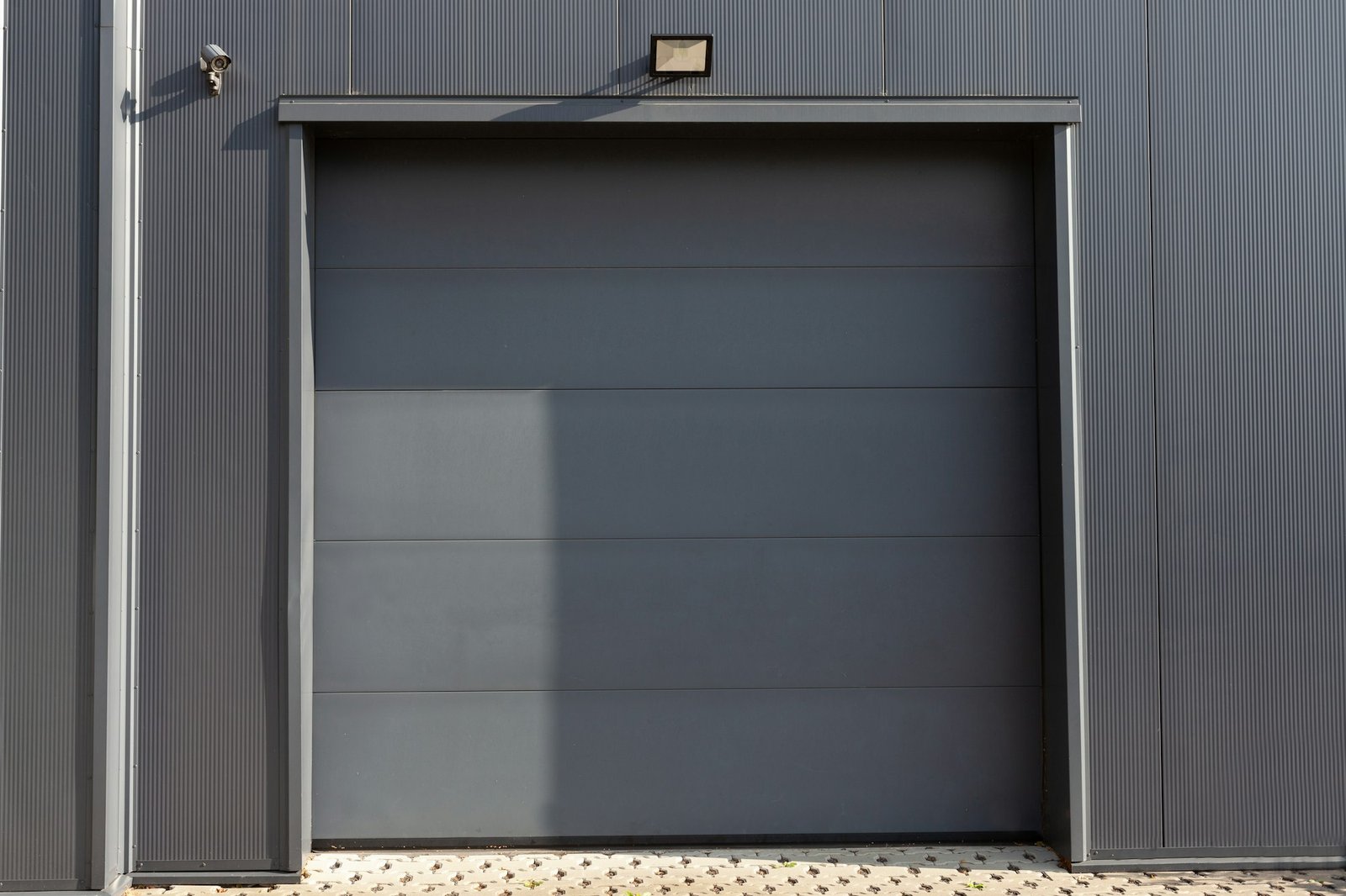 Closeup shot of a gray garage door